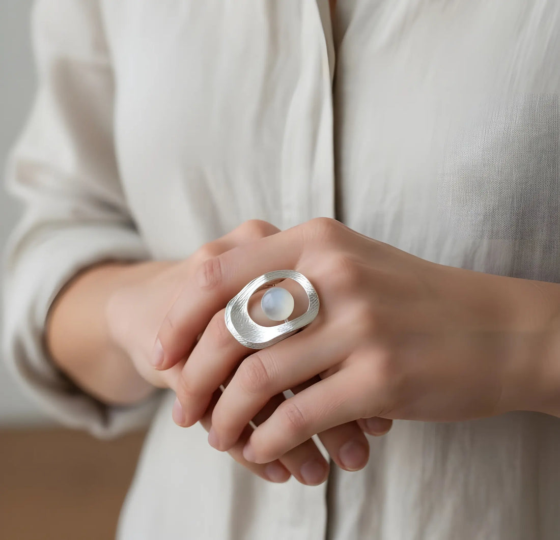 The Lunar Silver Open Sphere Sculpt Ring Vault 9